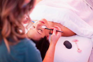 Woman giving a massage to another woman