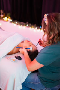 Woman giving a massage to another woman