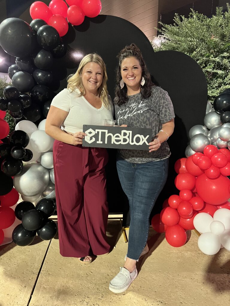 Jessi Cabanin posing with This Way to Fabulous CFO Jess on Season 17 of the Blox