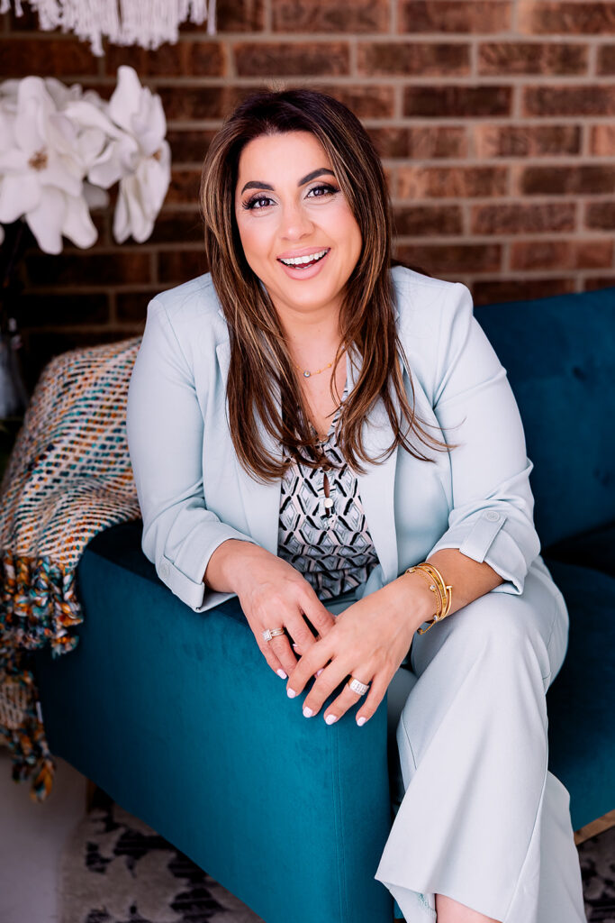 professional woman sitting on a couch