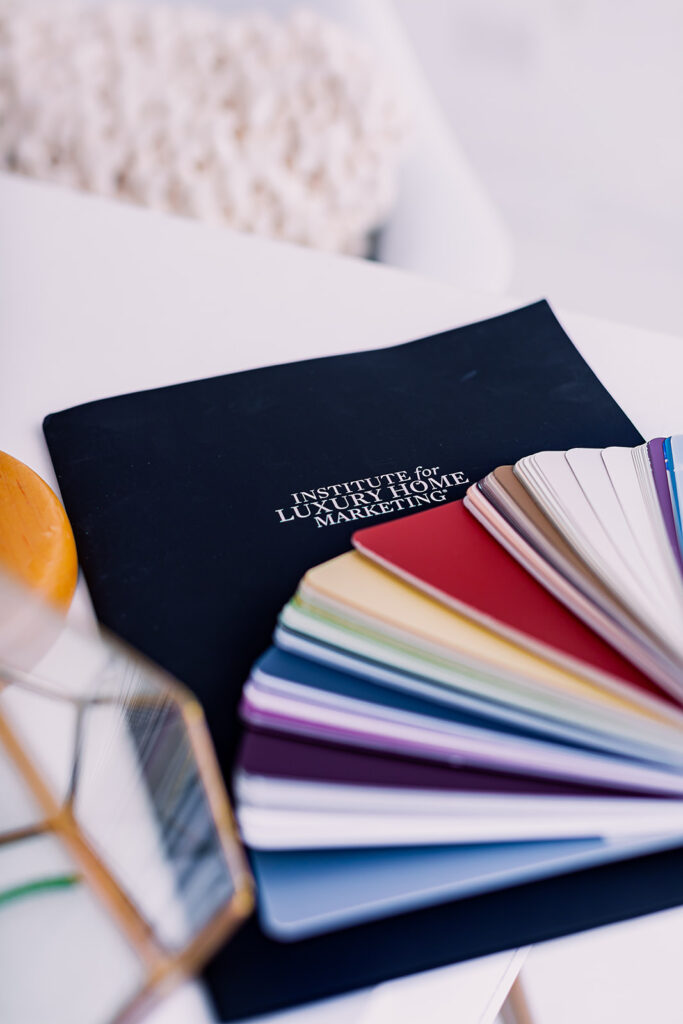 luxury home marketing folder with color swatches