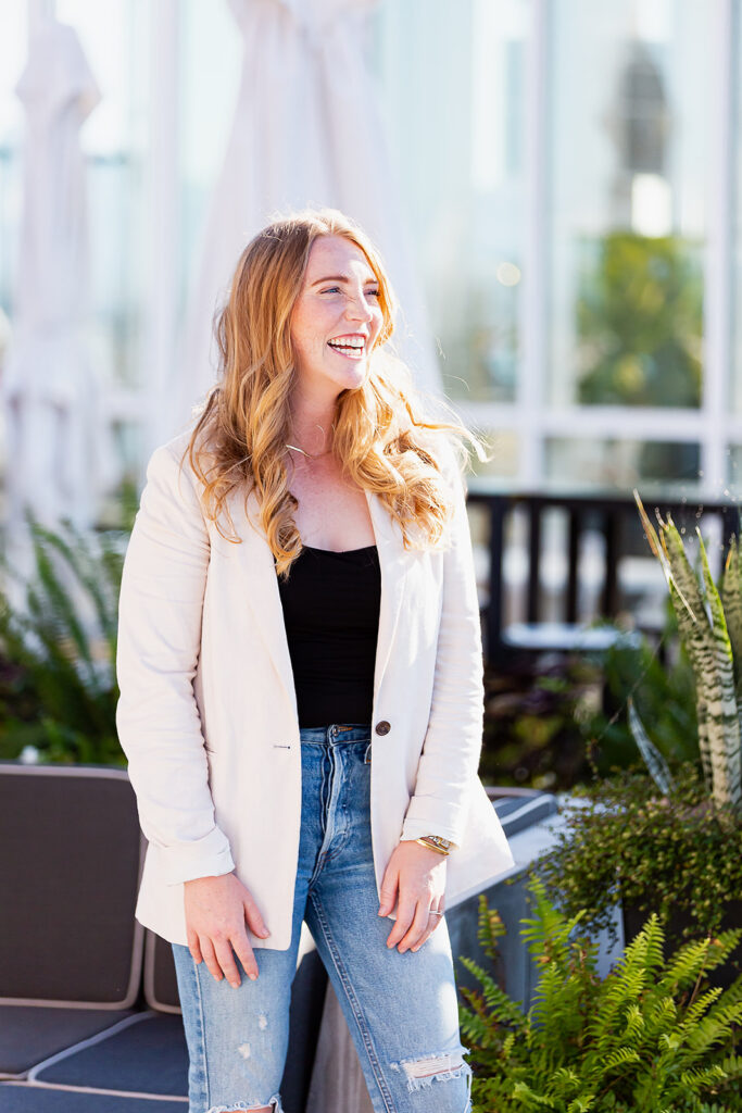 sunny day outdoor branding image of a professional woman in the city