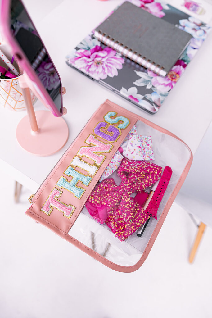 desktop flat lay of Jacquelin Castillo's affiliate products for Mom Like a Boss, photographed by This Way to Fabulous