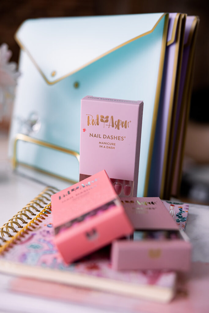 personal branding photo of the brightly colored feminine desk setup of Jacquelin Castillo of Mom Like a Boss photographed by This Way to Fabulous