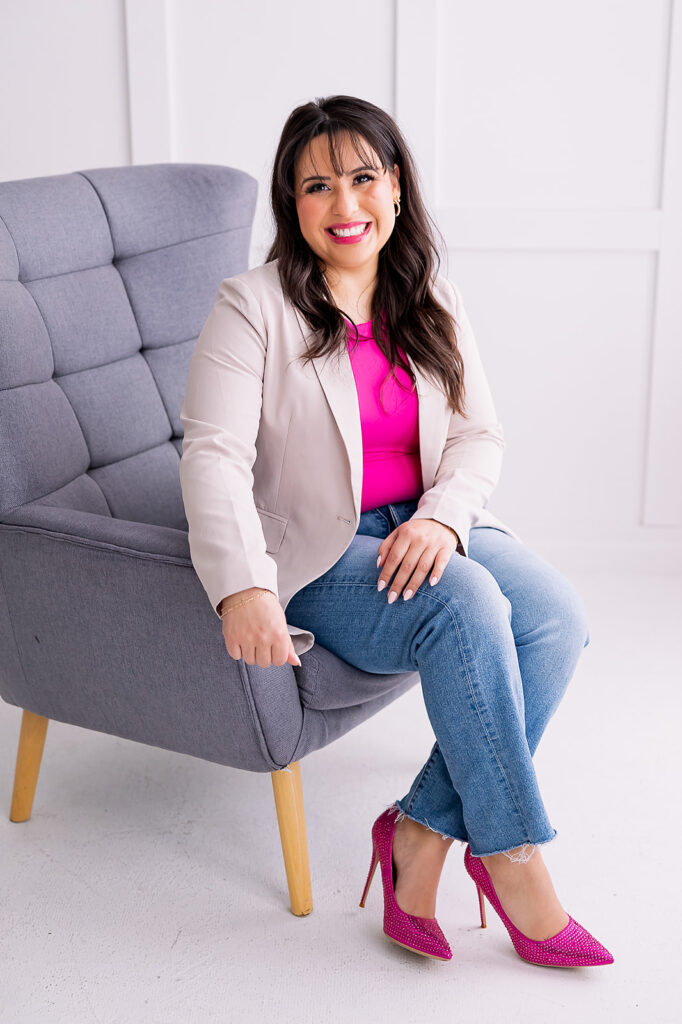 personal branding photo of Jacquelin Castillo of Mom Like a Boss wearing pink heels and a white blazer photographed by This Way to Fabulous