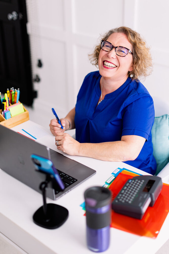 Amy from Clutter Care smiling during her professional organizer branding photoshoot by This Way to Fabulous