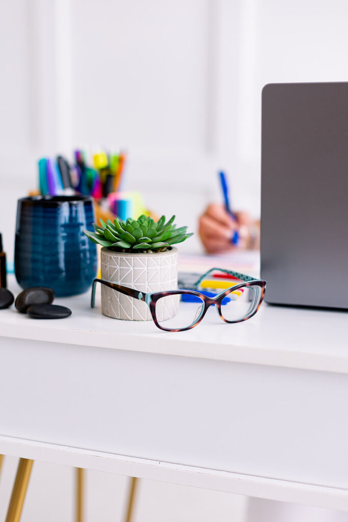 Brightly colored office supplies in Google Educator colors at a professional organizer branding photoshoot by This Way to Fabulous